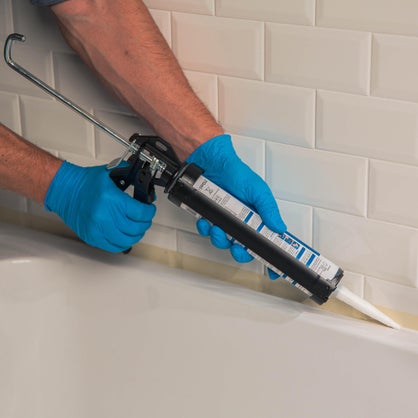 Pistolet pour mastic et perçage joint Dexter, acier noir.